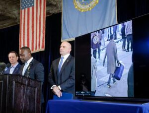 Lyonel Myrthil, special agent in charge of the New Orleans field office, second from left, shows footage of Shamsud-Din Jabbar