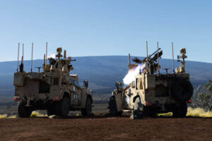 A Marine Air Defense Integrated System Mk 1 fires upon a small unmanned aircraft system