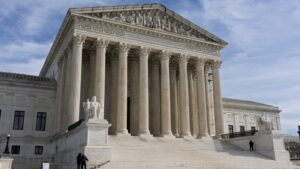 Supreme Court should keep whistleblower agency head in place for now, lawyers say in reply to Trump