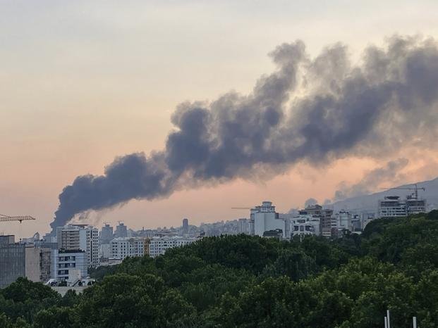 Smoke rises from the building of Iran