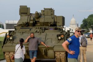 Trump gets chance to top France with military parade in DC