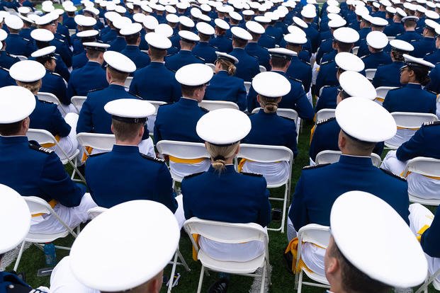 Cadets sit during the U.S. Air Force Academy Class of 2025 graduation ceremony at Falcon Stadium