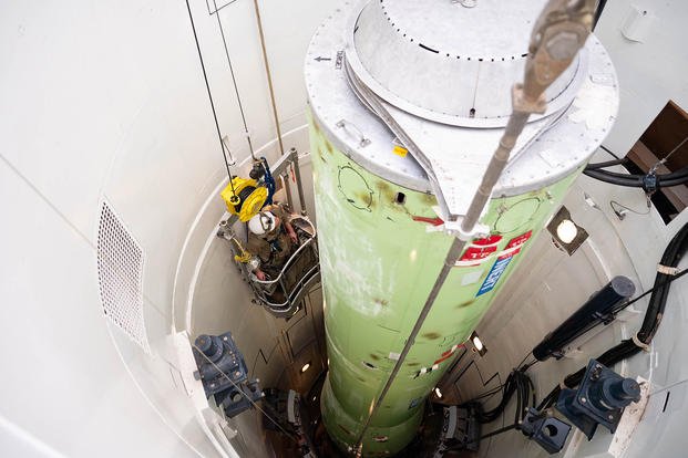 An Air Force airman is lowered into a training missile silo at Malmstrom Air Force Base in Montana on March 5, 2025. The Air Force is wrapping up an investigation into whether nuclear missile bases are unsafe places to work after members reported cancer diagnoses.