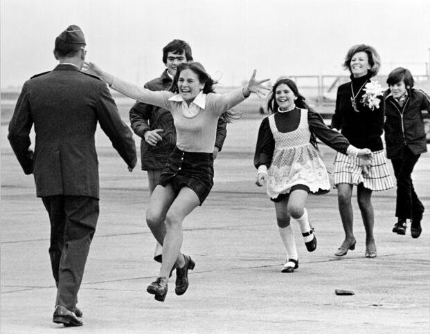 Released prisoner of war Lt. Col. Robert L. Stirm is greeted by his family at Travis Air Force Base