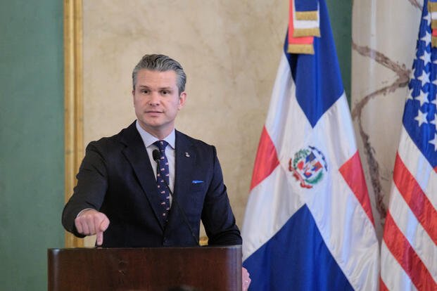 U.S. Secretary of Defense Pete Hegseth gestures during a press conference after a meeting with Dominican Republic President Luis Abinader at the National Palace in Santo Domingo, Dominican Republic, Wednesday, Nov. 26, 2025. (AP Photo/Ricardo Hernadez)