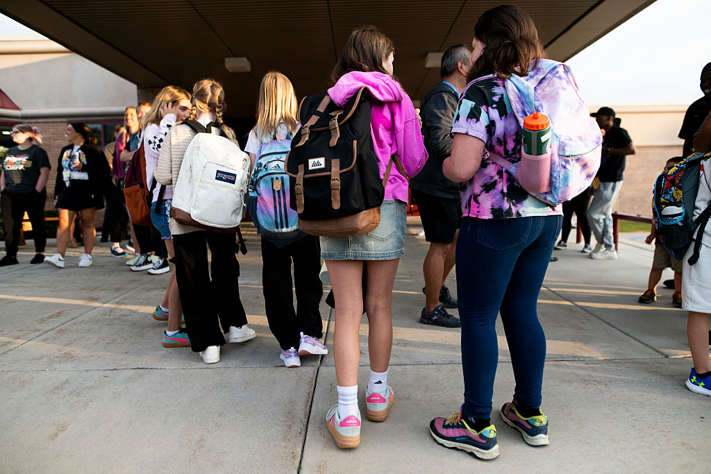 Students arrive for the first day of school.