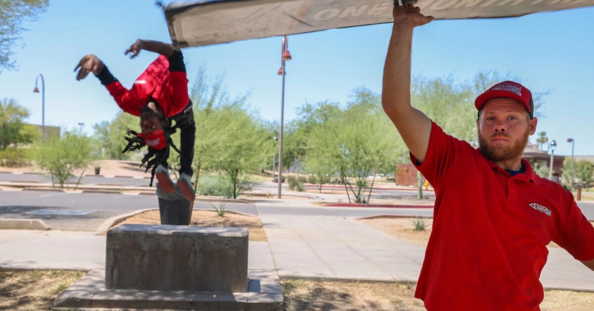This Arizona sign spinner is TikTok famous — and outside for hours in the summer heat