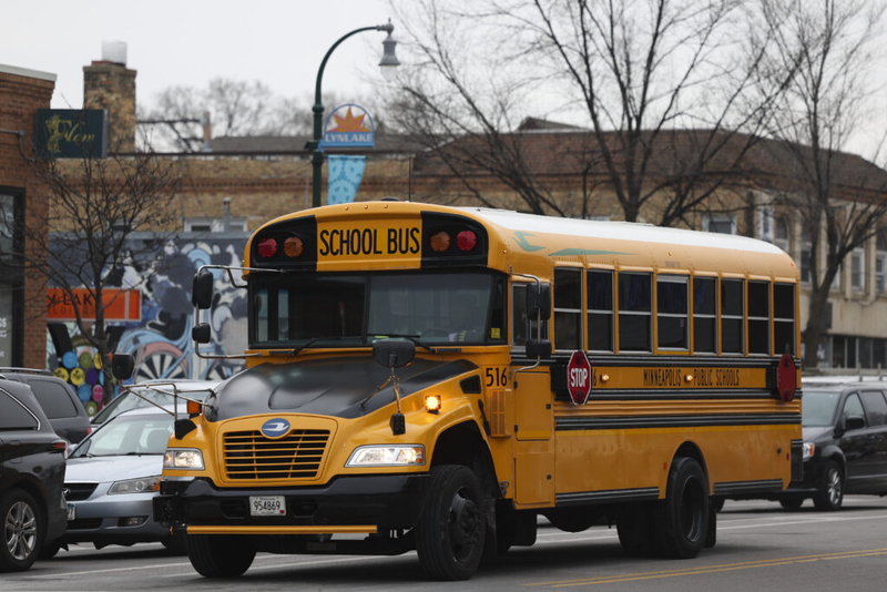 A school bus stops at a south Minneapolis intersection in January 2025. (Ellen Schmidt/Minnesota Reformer)