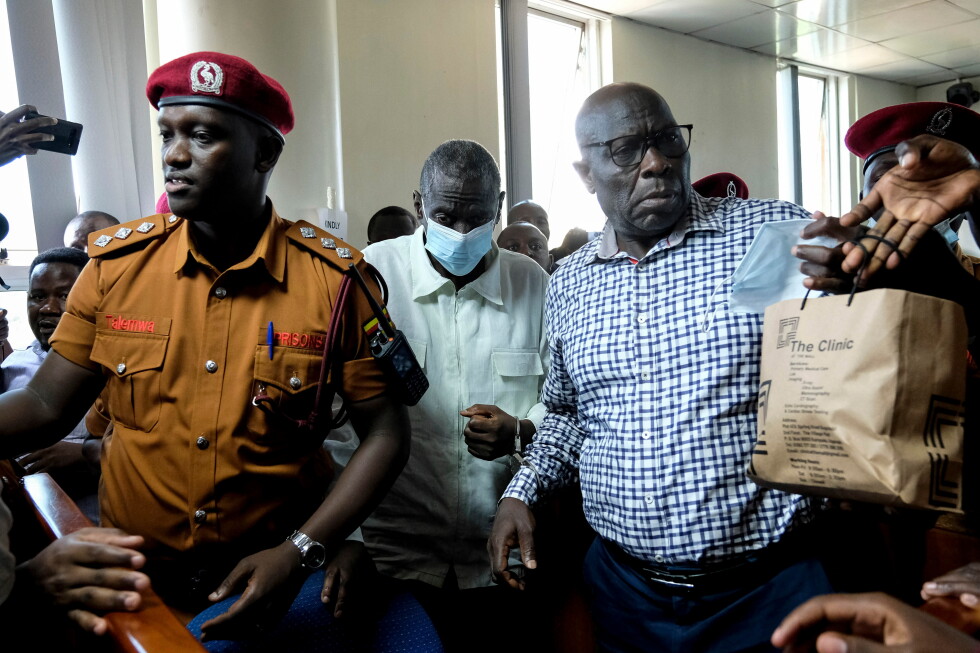 Ugandan opposition figure Besigye collapses in the dock at treason trial