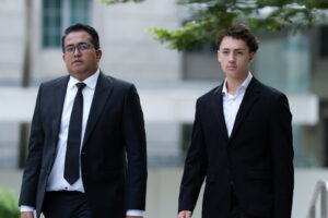 Singapore court fines French student for his straw-licking stunt