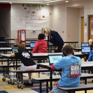 Students study on laptops inside an elementary school in Farmington, Arkansas, on March 19, 2026. School districts nationwide are grappling with which artificial intelligence tools to invest in. (Photo by Antoinette Grajeda/Arkansas Advocate)