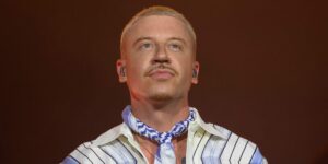 Macklemore Says He's Off Ed Sheeran Tour After Robert Kraft Pressure
