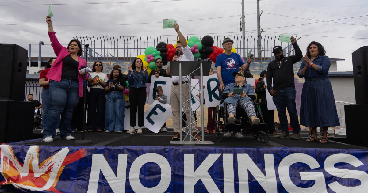 No Kings protesters march to drop off their early ballots in downtown Phoenix