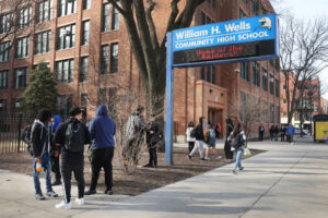 Students leave William H. Wells Community High School at the end of the school day in Chicago. The federal Centers for Disease Control and Prevention’s latest national survey of high school students focuses on diet, physical activity, sleep, digital behavior and mental health. (Photo by Scott Olson/Getty Images)